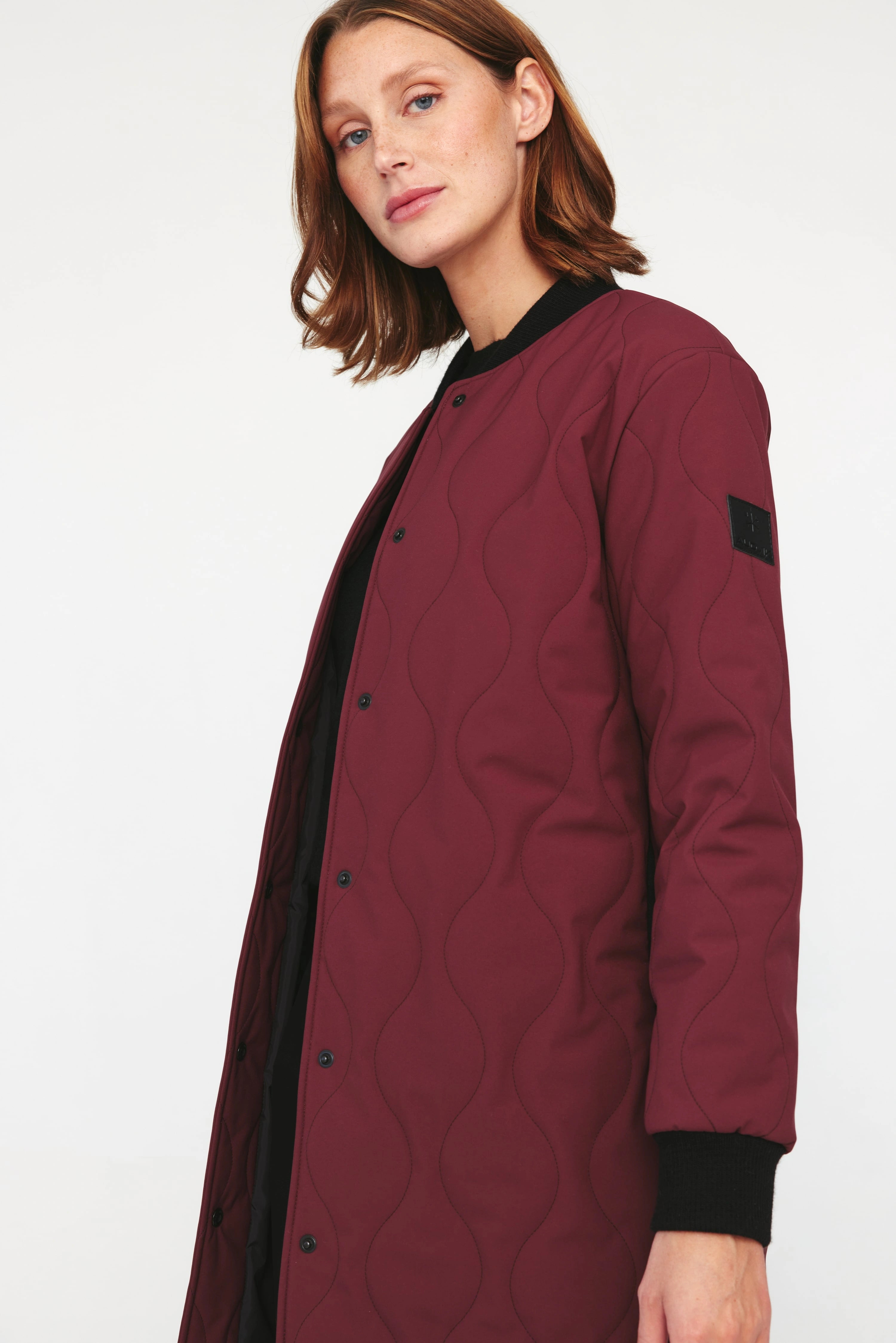 Manteau bourgogne femme sale