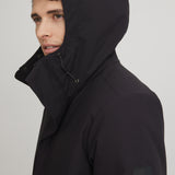 Manteau chaud et chic pour homme. Manteau noir fabriqué au Québec. Tissu imperméable et respirant.