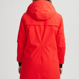Manteau rouge feu pour femme. Bande réfléchissante au dos. Chaud et confortable pour les hivers québécois.