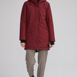 Manteau d'hiver mi-long fabriqué au Québec. Tissu en polyester recyclé.