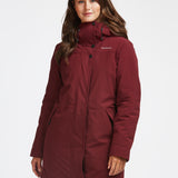 Manteau d'hiver mi-long pour femme. Manteau d'hiver fait au Québec, fait à partir de tissu haute performance. Manteau Imperméable, manteau coupe-vent et manteau respirant. Isolant synthétique et vegan. Manteau chaud bourgogne.