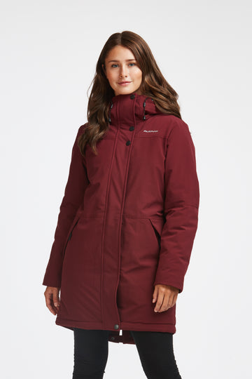 Manteau d'hiver mi-long pour femme. Manteau d'hiver fait au Québec, fait à partir de tissu haute performance. Manteau Imperméable, manteau coupe-vent et manteau respirant. Isolant synthétique et vegan. Manteau chaud bourgogne.