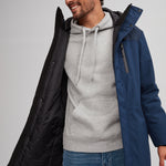 Manteau chaud bleu marine pour homme avec tuque jaune. Manteau d'hiver sport et vegan