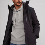 Manteau chaud noir pour homme. Isolant synthétique. Tissus de polyester recyclé.